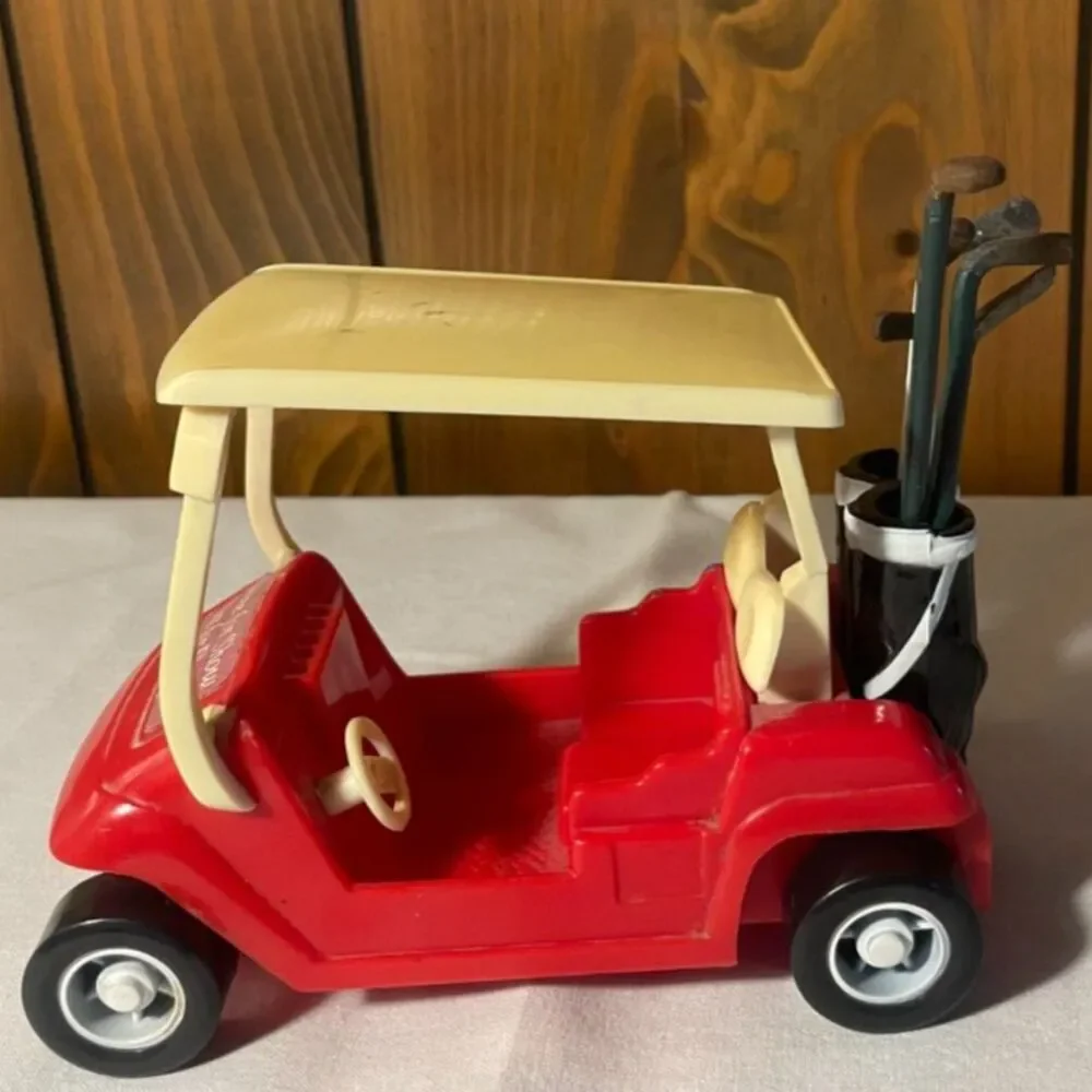 Vintage plastic toy golf cart